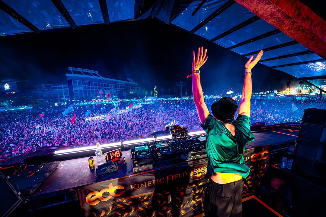 A DJ performs at EDC Orlando.
